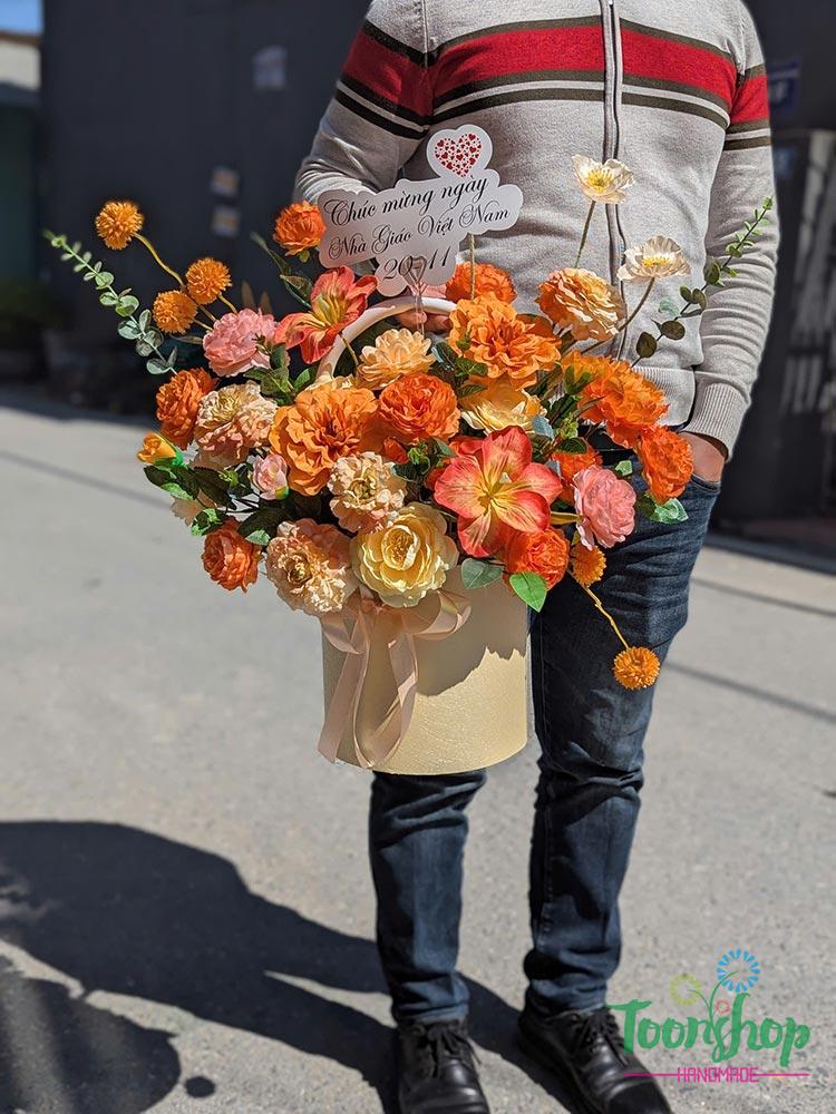 Giỏ hoa lụa khai trương màu cam