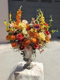 Bình hoa lụa để phòng khách màu cam