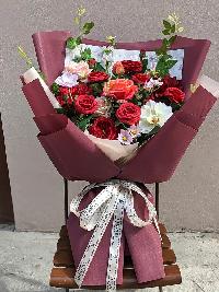 Bó hoa lụa cao cấp mẫu mới tone màu đỏ