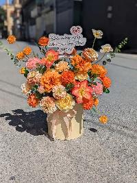 Giỏ hoa lụa khai trương màu cam